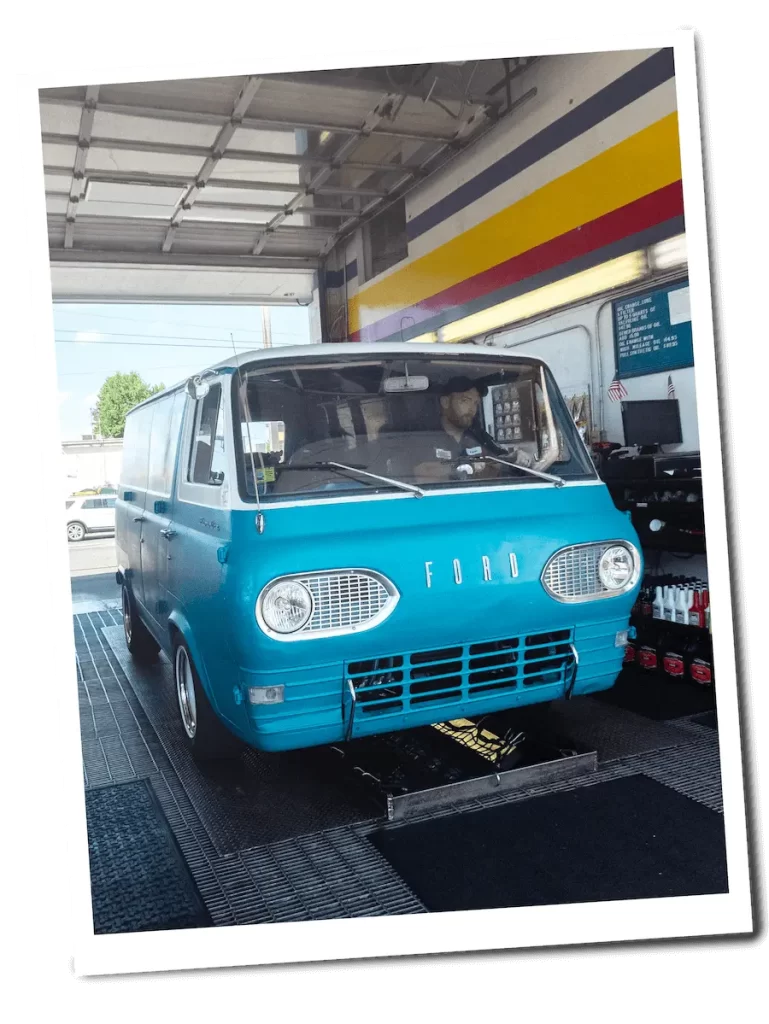 Classic Car in Mechanic Oil Change Shop, Eugene